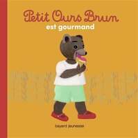 Petit ours brun est gourmand