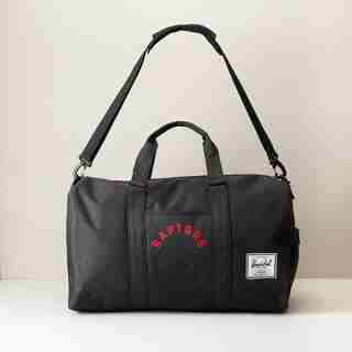 HERSCHEL NOVEL DUFFLE BAG TORONTO RAPTORS