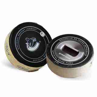 VANCOUVER CANUCKS GAME-USED PUCK BOTTLE OPENER