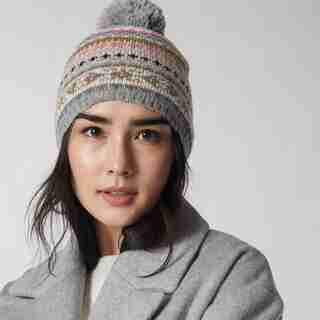 LOVE AND LORE RAINBOW FAIR ISLE POM POM HAT GREY AND MULTI-COLOURED