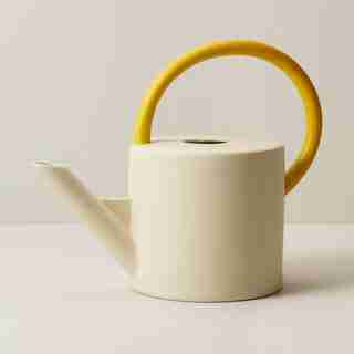 OUI WATERING CAN BISQUE SUNFLOWER
