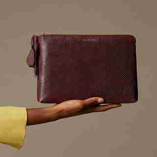 LOVE AND LORE BOW CLUTCH POUCH AUBURN SNAKE