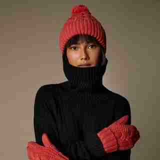 LOVE AND LORE SUSTAINABLE STYLE ECO CABLE KNIT POM HAT CORAL