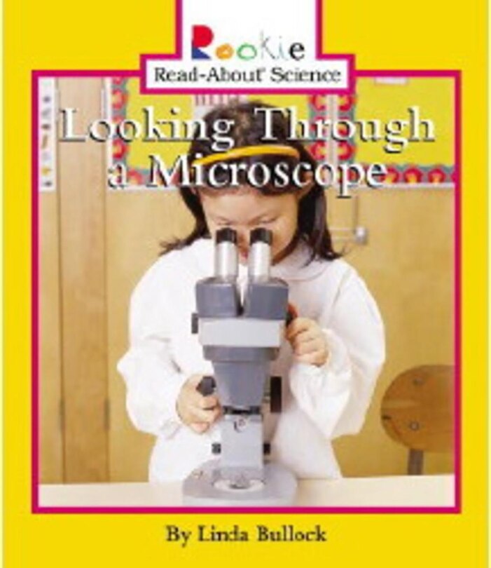 Front cover_Looking Through a Microscope (Rookie Read-About Science: Physical Science: Previous Editions)
