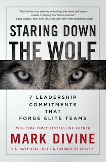 Front cover_Staring Down The Wolf