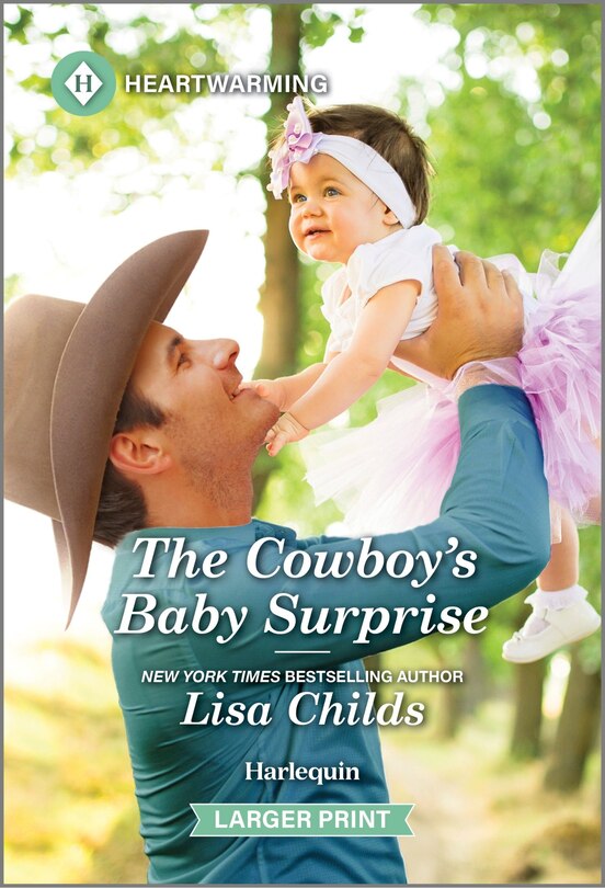 Front cover_The Cowboy's Baby Surprise
