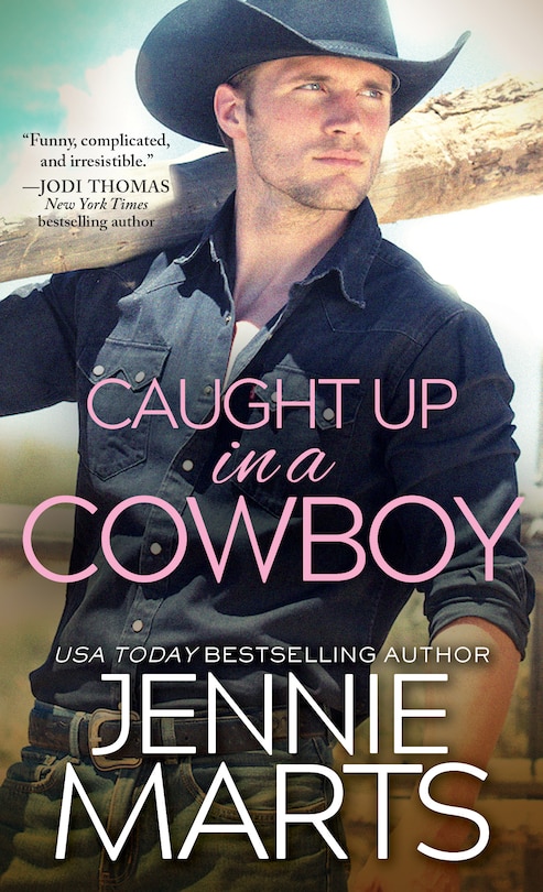 Couverture_Caught Up In A Cowboy