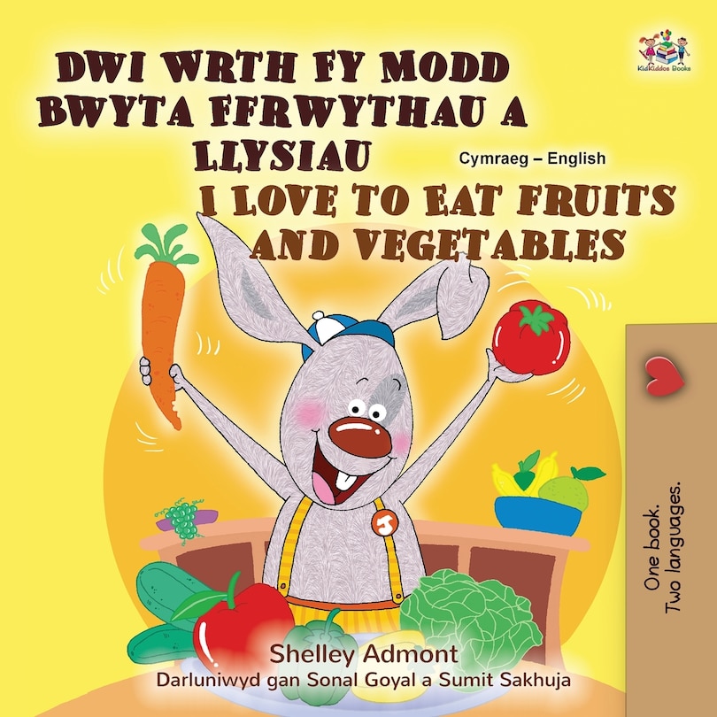 Front cover_I Love to Eat Fruits and Vegetables (Welsh English Bilingual Children's Book)