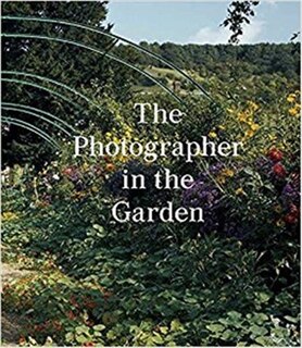 The Photographer In The Garden