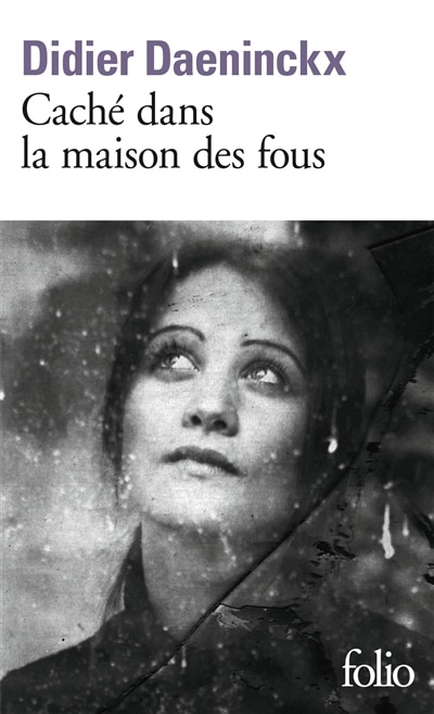 Front cover_Caché dans la maison des fous