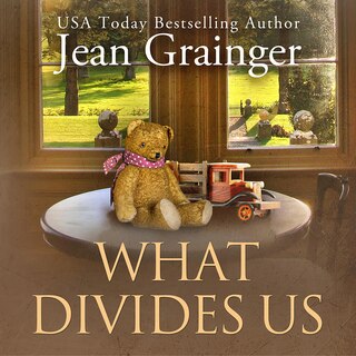Front cover_What Divides Us
