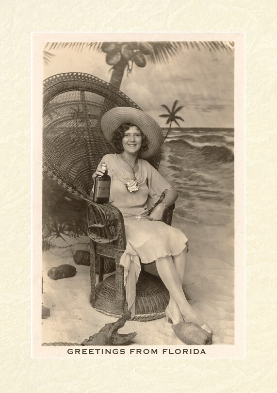 Front cover_Vintage Lined Notebook Greetings from Florida, Woman in Chair with Gator